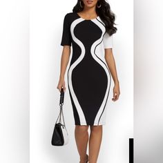 In Black And White With A Geometric Colorblock Design, This Sheath Dress Is The Epitome Of Modern Elegance. Team It With Heels And You're Ready For The Office. Crewneck. Short Sleeves. Sheath Silhouette. Geometric Colorblock Design. Elegant Spliced Midi Dress, Elegant Midi Dress With Splicing, White Fitted Dress With Splicing Details, Black Fitted Midi Dress With Splicing, Fitted Black Midi Dress With Splicing, Elegant Fitted Mini Dress With Splicing, Fitted White Dress With Splicing Detail, Chic Fitted Midi Dress With Splicing, Fitted Midi Dress With Splicing