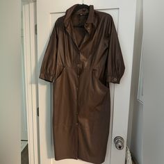 Zara Woman's Faux Leather Brown Shirt Dress Without Belt Size Xl: Never Worn Great Condition. Size Xl : Shoulder Is 17 Inches Under Armpit Is 19" Waist Is 16 " Hip Is 19" Brown Fall Midi Dress With Button Closure, Brown Collared Midi Dress Fitted, Zara Button-up Shirt Dress For Fall, Brown Button-up Fall Midi Dress, Zara Shirt Dress With Buttons For Fall, Brown Button-up Midi Dress For Fall, Brown Fitted Collared Midi Dress, Fall Leather Long Sleeve Dresses, Fall Long Sleeve Leather Dresses