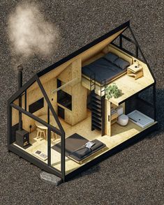 an aerial view of a tiny house on the ground