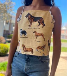 Cropped tank tops are made of vintage tea towels. Made to fit XXS to S! Check measurements for each top below! I am 36-28 for reference, all three are slightly tight on me around bust. All tops are best for 31" to 35" bust! Dogs printed top length - 17.5" Arm hole pt to pt - 17.5"  Best for bust - 31" to 34.5" waist - up to 28" only. Scottish recipes top length - 17.5" Arm hole pt to pt - 18"  Best for bust - 32" to 35" waist - up to 30" only. Floral top length - 16.5" Arm hole pt to pt - 18"  B Printed Fitted Summer Tank Top, Fitted Graphic Print Tank Crop Top, Printed Fitted Crop Top For Summer, Cropped Graphic Print Tops For Summer, Printed Cropped Summer Crop Top, Printed Summer Crop Top, Summer Printed Cropped Crop Top, Vintage Summer Crop Top With Graphic Print, Summer Graphic Print Tank Crop Top