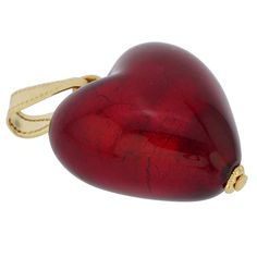 The unique beauty of Venice comes to life in this classic Murano Glass Heart Pendant. The perfect jewelry piece for everyday or a special day, this handcrafted ruby red heart pendant will make you feel elegant and stylish wherever your journey takes you. This Murano pendant also makes a wonderful gift for a special woman in your life. Measurements: The pendant measures 3/4 x 3/4 inch. It comes with an attractive velvet pouch, and the certificate of authenticity. Because each Murano Glass piece i Elegant Heart Necklace For Valentine's Day Keepsake, Elegant Red Heart Pendant Jewelry, Elegant Heart-shaped Keepsake Jewelry, Classic Red Heart Pendant Jewelry, Luxury Red Jewelry With Heart Charm, Elegant Heart Charm Necklace As Keepsake, Red Heart Charm Necklace For Wedding, Elegant Heart Charm Necklace For Keepsake, Elegant Heart-shaped Necklace For Keepsake