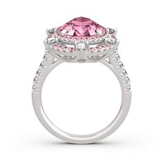 With grace and shimmer, this sparkling ring is a classic style that complements her sophisticated taste. Crafted in sterling silver, it features a brilliant pink stone wrapped in double halo frames of pink and white stones,bringing out its beauty and sparkle. Glamorous and classic, this exceptional ring will forever express your eternal love and undying commitment.Carat Weight: 6.05 ctStone Size: 9*13 mmStone Type: Jeulia® StoneNumber of Stones: 1 Stone Color: Fancy PinkStone Shape: PearCarat Weight: 2.051 ctStone Size: 2.5,1.7,1.3,1 mmStone Type: Jeulia® StoneNumber of Stones: 76 Stone Color: Diamond White, Fancy PinkStone Shape: RoundWeight: 6.84 gWidth: 22.55 mmHeight: 7.7 mmThickness: 2.95 mmMaterial: 925 SilverPlating Color: Silver Formal Pink Cluster Ring With Brilliant Cut, Classic Pink Diamond Cluster Ring, Fine Jewelry Pink Halo Ring With Accent Stones, Pink Diamond Ring With Halo Setting For Formal Events, Pink Diamond Ring With Halo Setting For Formal Occasions, Classic Pink Cluster Ring For Formal Occasions, Pink Cluster Rings With Brilliant Cut, Luxury Pink Oval Cluster Ring, Formal Pink Diamond Cluster Ring