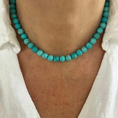 This beautiful handcrafted necklace is made with genuine 8mm aqua blue turquoise beads from the Kingman Turquoise Mine in Kingman Arizona. The soft aqua blue color is complimented by a hint of brown matrix. This necklace is an absolutely stunning beautiful premium quality highly saturated aqua blue turquoise. Included is a 2" extender, and can be ordered without by leaving me a message at checkout.  Choose sterling silver, 14k yellow gold filled, or 14k rose gold filled findings.   The matching Turquoise Necklace With 8mm Round Beads, Turquoise Necklaces With 8mm Round Beads, Turquoise Necklaces With 8mm Beads, Turquoise Necklace With Round Beads As A Gift, Turquoise Single Strand Necklace With Round Beads For Gifts, Turquoise Single Strand Necklace With Round Beads, Turquoise Beaded Necklace With 8mm Beads, Turquoise Beaded Necklaces With 8mm Beads, Turquoise Beaded Necklaces With 8mm Beads For Healing