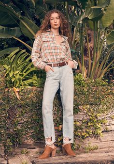 In a vintage and distressed wash, this Boyfriend Madison is a pair of tapered-fit jeans inspired by men's fits. The boast distressing near the pockets and ankles for a well lived -in look. They are made of pure cotton denim and feature five-pocket styling, a zip fly, and are cropped at the ankle cuffs. Distressed Cropped Jeans In Rigid Denim For Fall, Distressed Rigid Denim Cropped Jeans For Fall, Casual Faded Jeans With Frayed Hem, Faded Casual Jeans With Frayed Hem, Faded Jeans With Frayed Hem Casual Style, Casual Distressed Medium Wash Cropped Jeans, Distressed Cotton Cropped Jeans For Fall, Rugged Jeans With Five Pockets For Fall, Casual Washed Faded Cropped Jeans