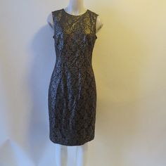 Nwt Womens White House Black Market Black Pewter Floral Lace Sheath Dress Sz 8 * Color: Pewter, Black Size: 8 Back Zip Closure Sleeveless Fully Lined Single Back Vent Material: 72% Cotton 26% Nylon 2% Rayon Measurements: Flat/Un-Stretched Pit- Pit: 17.25" Waist: 15.25" Hips: 19.25" Length: 39.5" Ticketed Price $199 Nwt, New With Tags...Ver_bali_458-4### Lace Peplum Dress, Black One Shoulder Dress, Black Embroidered Dress, White Strapless Dress, Mini Sheath Dress, Black Strapless Dress, Lace Sheath Dress, Shift Dress Black, Sleeveless Sheath Dress