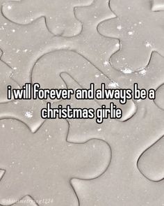 the words i will forever and always be a christmas girl lie on top of snow