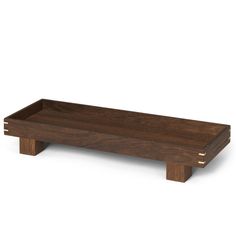 a wooden tray that is sitting on top of a table