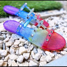 Fun And Trendy Jelly Sandals Multicolor Flat Sandals For Parties, Multicolor Jelly Sandals For Summer Beach, Multicolor Jelly Sandals For Beach In Summer, Fun Multicolor Sandals For Summer, Multicolor Flat Jelly Sandals For Summer, Fun Multicolor Summer Sandals, Multicolor Flat Synthetic Jelly Sandals, Trendy Rainbow Open Toe Sandals, Multicolor Synthetic Jelly Sandals For Summer