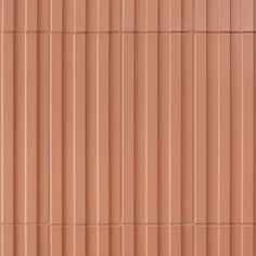 a close up view of the side of a building with vertical blinds on it's sides