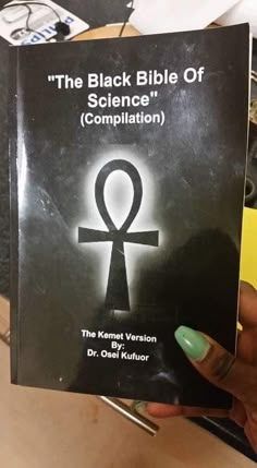 the black bible of science compilation by dr oesi kufferr, with an egyptian symbol on it