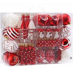 red and white christmas ornaments in a clear box