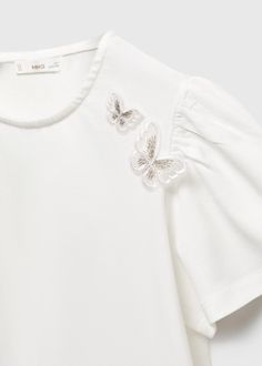 Embroidered butterflies t-shirt - Girls | Mango Kids USA White Butterfly-shaped Top For Summer, White Butterfly T-shirt For Spring, Cotton Tops With Butterfly Print And Short Sleeves, Short Sleeve Cotton Tops With Butterfly Print, Summer Cotton Tops With Butterfly Embroidery, Casual White Top With Butterfly Embroidery, White Cotton Tops With Butterfly Embroidery, Short Sleeve Cotton Tops With Butterfly Embroidery, White Short Sleeve Top With Butterfly Print