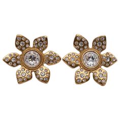 Yves Saint Laurent (Made in France) Gilted metal clip-on earrings paved with rhinestones. Collection Prêt-à-Porter 1993. Additional information: Dimensions: 4 W x 5 H cm (1.57" W x 1.97" H) Condition: Very good condition Seller Ref number: BO10 Luxury Gold-tone Metal Clip-on Earrings, Yves Saint Laurent Vintage Jewelry, Luxury Gold Clip-on Chandelier Earrings, Luxury Vintage Yellow Gold Clip-on Earrings, Luxury Green Vintage Clip-on Earrings, Made In, Made In France, Clip On Earrings, Yves Saint Laurent