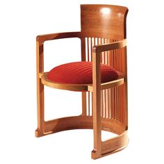 a wooden chair with a red cushion on it's back and armrests