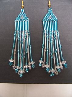 Teal Chandelier Earrings by CraftingAddiction on Etsy Teal Chandelier, Flag Beads, Walker Bag, Beaded Banners, Eyeglass Holder, Rainbow Earrings, Bugle Beads, Milwaukee Wi, Bead Stringing