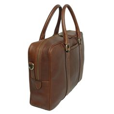 Old Angler Chestnut Brown Soft Calfskin Leather Briefcase 100% soft calfskin leather briefcase Synthetic lining - Padded compartment for 13" laptop Interior pocket Exterior front pocket Antique brass finished accessories Removable/Adjustable leather and synthetic shoulder strap with pad Size cm. - 42 x 30 x 10 Weight Kg. - 1.6 Handmade in Italy Classic Bag With Laptop Sleeve, Classic Briefcase With Laptop Sleeve, Classic Brown Briefcase For Travel, Business Cognac Shoulder Bag With Smooth Grain, Business Shoulder Bag In Cognac With Smooth Grain, Classic Brown Laptop Bag For Travel, Timeless Brown Laptop Bag For Travel, Elegant Cognac Laptop Bag For Business, Classic Leather Laptop Bag With Smooth Grain