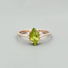 "Description Stone Name: Natural Peridot Shape : Marquise Stone Size : 5x10 mm Nickel Free) - also available in 925 sterling silver with rose gold plated Metal: 925 Sterling Silver Beautifully handcrafted as u can see in pics100% handmade more quantity available on demand We accept Custom Order If you have any questions about this piece or if we can help you with any of our other products please feel free to contact us through Etsy I am more than happy to make customs orders or price for wholesa Green Marquise Diamond Promise Ring, Lime Green Gemstone Ring Jewelry, Lime Green Gemstone Ring, Lime Green Peridot Jewelry For Wedding, Peridot Birthstone Diamond Ring Fine Jewelry, Green Gemstone Cluster Ring For May Birthstone, Fine Jewelry Peridot Rings For May Birthstone, Peridot Diamond Ring For May Birthstone, Lime Green Peridot Rings In Fine Jewelry Style