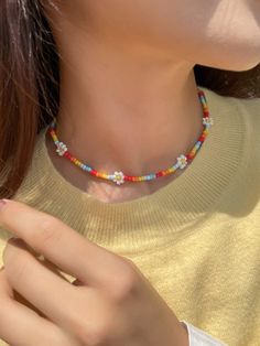 Rainbow flowers beaded chocker necklace for women. Wether it is a summer beach party, birthday, evening date, it will complete your total look beautifully. If you want to make happy your loved one or yourself, then you found a perfect gift. Length: 38+5cm Material: High quality zinc alloy.  ✦ SHIPPING & PACKAGING ✦ Each product packed in a very cute packaging 🎁 The items will be send 1-2 working days after payment. The package will be send from the Germany 🇩🇪 . It depends on where you live ho Beaded Flowers Necklace, Flowers Beads Necklace, Plastic Bead Necklace, Diy Flower Necklace, Flower Seed Bead Necklace, Seed Bead Flower Necklace, Flower Beads Necklace, Beaded Necklace Flower, Flower Bead Necklace