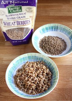 two bowls filled with brown rice next to a bag of wheat