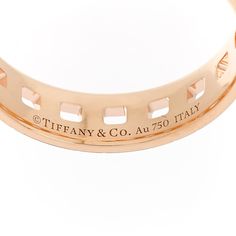 This is an authentic TIFFANY 18K Rose Gold T True Wide Ring size 58 or 8.5. The ring is crafted of 18 rose gold and features a band of alternating beveled "T" motifs. Rose Gold Band Ring, Tiffany Rings, Tiffany T, Wide Ring, Tiffany Jewelry, Gold Band Ring, Wide Rings, The Ring, 18k Rose Gold