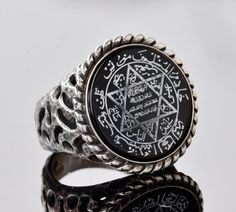 "Handmade Sterling silver Turkish special products # Metal : 925 Sterling Silver # Weight : 12.55 gr Stone Size :21.00 The seal of Solomon, also known as the face of Hz. Solomon's ring is said to have powers. There has been some curiosity about what he wrote on his seal, Süleyman. On this face, there is the secret \"Ismi Azam\" prayer of the angels and human beings who are outside of human beings. Name Prayer Meaning There is no god but Allah. However, He is Jalil and Jabbar. There is no god but Silver Star Of David Spiritual Rings, Silver Spiritual Rings With Star Of David, Silver Star Of David Ring In Spiritual Style, Silver Engraved Star Of David Ring, Solomons Ring, There Is No God, Anchor Rings, David Star, Seal Of Solomon