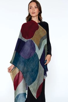 Our Reena Wool Wrap is made with fine wool and features contemporary prints in vibrant colors. This beautiful shawl is ultra soft and luxurious, and showcases the fine woolen weaves of Northern India with a contemporary abstract print design.  The sturdy, lightweight weave makes it a versatile accessory that can be worn as a shawl or a scarf. -------------------------------- Material: 100% Wool Color: Slate & Garnet Shape: Rectangle Care: Hand Wash with Gentle Detergent, Hang to Dry Dimensions: Multicolor Silk Scarf For Winter, Multicolor Pashmina Shawl Scarf, Multicolor Shawl Wrap For Fall, Multicolor Shawl Scarves For Fall, Bohemian Multicolor Scarf With Abstract Print, Bohemian Multicolor Scarves With Abstract Print, Caftan Tunic, Fair Trade Clothing, Wool Wrap