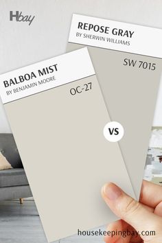 The image compares two paint colors. On the left is "Balboa Mist" by Benjamin Moore (OC-27), a soft, warm light greige with subtle beige undertones. On the right is "Repose Gray" by Sherwin Williams (SW 7015), a cooler gray with hints of beige and blue undertones. A "VS" symbol separates the two, highlighting the difference between the warmer tones of Balboa Mist and the cooler, more neutral Repose Gray. Balboa Mist, House Color, Grey Kitchen Cabinets, Refresh Your Home, Coastal Interiors