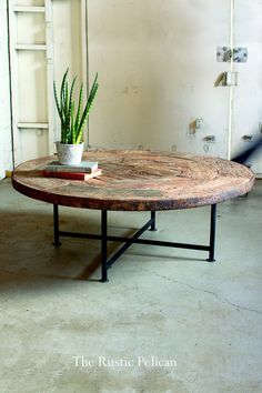 Rustic coffee table made of a reclaimed wood wagon wheel Wagon Wheel Table, Wheel Coffee Table, Antique Wagon Wheels, Wooden Wagon Wheels, Antique Wagon, Wood Wagon, Wooden Wagon, Coffee Table Farmhouse, Design Salon