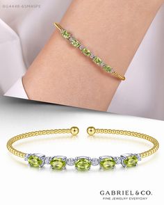 Delicate beading of warm 14K yellow gold bujukan beading encompasses the foundation of this bangle. Giving it a slightly sultry sparkle are its five beautiful stations of yellow/green toned peridots. Adding a more luxurious quality, between each peridot are twinkling 0.20 ct diamond stations.   
#YellowGold#YellowGoldBracelet#GabrielNY #UniqueJewelry#FineJewelry#GabrielAndCo#BujukanBabe #Bujukan#Bracelet#YellowGold#DiamondBracelet
#DiamondStationsBracelet#YellowGoldBangle  #Bangles#Bangle Luxury Yellow Gold Beaded Gemstone Bracelets, Luxury Green Diamond Bangle Bracelet, Luxury Yellow Gold Birthstone Bracelet, Luxury Yellow Gold Beaded Bracelets With Gold Beads, Luxury Yellow Gold Birthstone Bracelets, Luxury Green Gold Bangle Bracelet, Luxury Peridot Gemstone Bracelets, Luxury Yellow Gold Bracelet For May Birthstone, Luxury Modern Green Bracelets