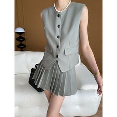 Summer Gray  Suit Vest and Pleated Skirt Set Fabric: 77% Polyester+16%Cotton+7%Spandex Size: S, M, L Multiple Color Selections: Gray  Season: Summer Fitted Pleated Skirt For Summer Workwear, Fitted Pleated Skirt With Buttons For Spring, Spring Workwear Pleated Skirt With Buttons, Spring Office Mini Skirt With Button Closure, Fitted Skirt For Office Wear In Summer, Trendy Mini Skirt With Buttons For Work, Spring Workwear Skort With Buttons, Fitted Office Wear Skirt For Summer, Fitted Skirt Suit With Pleated Skirt For Workwear