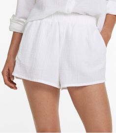 Cloud-like softness, effortless styling and a wonderfully crinkled texture in 100% cotton. These flattering cover-up shorts are the ideal layer for cool, carefree coverage by the water or a casual trip into town. High-Rise (Classic Fit): Sits at waist. Inseam 4". 100% cotton in a lightweight 4 oz. crinkled gauze. Machine wash and dry. Comfortable pull-on elastic waist. Two hand pockets. Imported. | Women's Cloud Gauze Cover-Up Shorts, Cotton Swimsuit Coverups Beach, Coverups Beach, Low Cut Swimsuit, Swimsuit Coverups, Active Swimwear, Modern Tops, Shorts Cotton, Active Outfits, Women's Cover Up