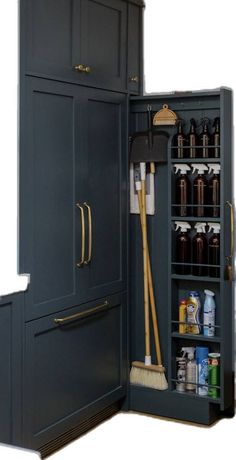 an open cabinet with cleaning supplies and brooms in the bottom section, on white background