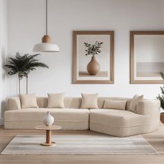 a living room filled with furniture and potted plants