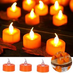 many orange candles are lit on a table with autumn leaves and fall leaves around them