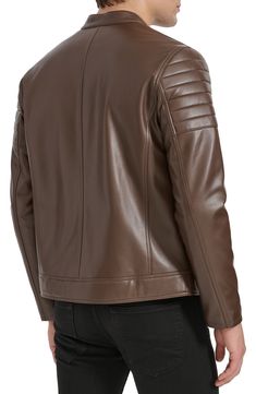 Ride off into the sunset in this sleek moto jacket expertly crafted from faux leather. 26 1/2" length Front zip closure Band collar Front zip pockets Lined 100% rayon with 100% polyurethane coating Spot clean Imported Winter Leather Biker Jacket With Faux Pockets, Fall Leather Biker Jacket With Ykk Zipper, Leather Jacket With Zipper Closure For Fall, Leather Jacket With Zipper For Fall, Leather Jacket With Asymmetrical Zip And Zipper Closure, Solid Biker Outerwear With Zipper Closure, Biker Style Solid Outerwear With Zipper Closure, Moto Leather Jacket With Zipper Closure For Work, Brown Leather Asymmetrical Zip Outerwear