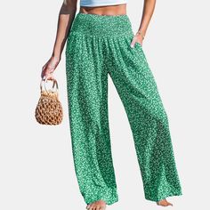 Step out in style with our Ditsy Smocked Waist Wide Leg Pants! These fashionable pants feature a ditsy floral print and a flattering smocked waist design, combining comfort with trendiness. The wide leg silhouette adds a touch of elegance and movement to your outfit, perfect for both casual outings and more dressed-up occasions. Product code: CAA02D4C009UC,CAA02D4C009RC Summer Vacation Floral Print Harem Pants, Summer Floral Print Harem Pants For Vacation, Summer Vacation Harem Pants With Floral Print, Casual Floral Print Harem Pants For Summer, Spring Beach Green Harem Pants, Floral Print Wide Leg Harem Pants For Vacation, Casual Floral Print Wide Leg Harem Pants, Casual Green Floral Print Pants, Casual Wide Leg Floral Print Harem Pants