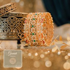 The perfect pick for your celebratory closet! Crafted with precision, presenting our Geenah Bangle with nakshi work intricately embellished with regal rows of stones. Available in various sizes. Gold-plated on high-quality brass as base metal. Size 2.8 is in-stock & ready-to-ship. The delivery time frame for Size 2.4 & 2.6 is 4-6 weeks. For custom or urgent requests, please contact support@alacouture.com. *Please Note: We use faux stones and beads in all of our jewelry. Faux Stone, Base Metal, Gold Plate, Bangles, Size 2, Plating, Brass, Beads, Stone