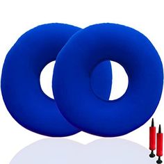 two large blue objects are next to each other with red markers in front of them