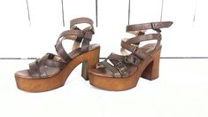 "Musse and Cloud open toe platform brown leather sandal/high heel strappy leather sandals/37 Measurements... - marked size: 37 - insole length: 9.25\" -width at ball: 3\" -heel: 3.75\" -front platform: 1.5\" Features... -genuine leather -high platform -4 adjustable straps -wooden/resin platform Condition... -excellent condition -gently worn...minimal wear DC2*" Leather Strappy Platform Heels, Strappy Leather Platform Heels, Brown Chunky Platform Sandals For Party, Leather Strappy Platform Sandals, Leather Platform Strappy Sandals, Brown High Heel Wedge Sandals, Brown Platform Open Toe Sandals, Brown Open Toe Platform Sandals, Brown High Heel Wedge Sandals With Heel Loop