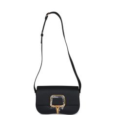 This Della Cavalleria Elan is of Black Epsom leather with gold hardware, features tonal stitching, rectangular shaped bag with curved base, gold half-bit clasp closure, a flat leather buckle shoulder/crossbody strap with one exterior back pocket. The interior is lined in Black swift leather and has one interior slip pocket on back wall.Collection: WOrigin: FranceCondition: New and never worn (plastic on hardware)Accompanied by: Hermes box, Hermes dustbag, felt, and carebookMeasurements: 9" width x 6" height x 2.5" depth; 19" strap drop Hermes Birkin 25, Hermes Birkin 30, Hermes Box, Birkin 25, Madison Avenue, Leather Buckle, Hermes Bag, Hermes Birkin, Crossbody Strap