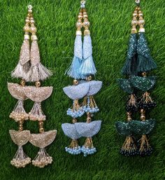 Indian Handmade Beaded Lahenga Latkan Tassels for Saree HandBags Hangings Dupatta Bridal Wedding dress for Women pair of 2 pcs Size - 30 cm Length  Item Description You can use this Beautiful pair of tassle for several DIY projects.  *These beautiful Tassel Latkans are used as the accessory for Lahenga and saree , but u can use according to your need and your innovative ideas. * Package contains 2 Latkan / 1 Pair you can use these latkans in various ways Craft Projects Designing Home Decoration Festive celebrations. Evening and party Apparels. Home décor items Apparel & Fashion Scarves n Stoles Headband, hats Table cover, curtains, Pillow covers, Cushion cover Shoe designing Headband, hats Table cover, curtains Designing stylish blouses Ship From New Delhi, India 2 Latkan / 1 Pair Green Bollywood Sets With Tassels, Bollywood Green Sets With Tassels, Multicolor Tassels Dupatta For Eid, Party Dupatta With Latkans For Eid, Eid Party Dupatta With Latkans, Festival Party Dupatta With Tassels, Party Dupatta With Tassels For Festivals, Traditional Beaded Sets For Festive Season, Traditional Multicolor Tassel Sets