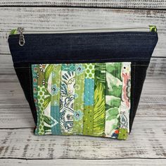 Green Themed Patchwork Boxy Bottom Zipper Pouch Make Up Bag Accessory Bag Approximate measurements 7.75"H x 10.75"Wx4"D The bag measures approximately 10.75" wide and tapers down to 7.25". This bag consists of various fabric pieces patched together to create a one of a kind bag. - 1 main zippered section This pouch is available and is ready to be shipped! Thank you for checking out this listing and please check out the other items in my shop. Green Rectangular Pouch With Zipper Pocket, Rectangular Green Pouch With Zipper Pocket, Square Pouch With Zipper Closure For Everyday Use, Everyday Square Pouch With Zipper Closure, Multicolor Rectangular Pouch With Zipper Pocket, Multicolor Zipper Tote Pouch, Make Up Bag, Santa Maria, Zipper Pouch