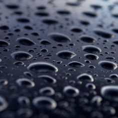 water drops on the surface of a car