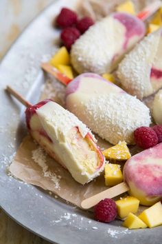 some fruit and ice cream are on a plate