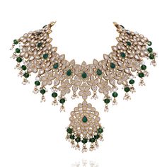 Perfect for weddings, this set promises to make you the center of attention with its luxurious craftsmanship and dazzling allure! Elevate your elegance with this stunning jewelry set, featuring emerald-green gemstones and intricate pearl detailing - designed to perfection with a blend of traditional charm and modern sophistication. The set includes a choker, a necklace, a maang teekah and a pair of earrings. Approximate earrings length is 3". Approximate maang teekah length is 4.5" and width is Heritage Jewellery, Center Of Attention, Waist Chain, Head Accessories, Green Gemstones, Stunning Jewellery, Gift Card Shop, Guinea Bissau, Ring Gift