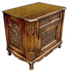 an old wooden cabinet with carvings on the doors and drawer drawers is shown against a white background