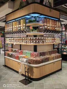 a store filled with lots of different types of food and drinks on display next to each other