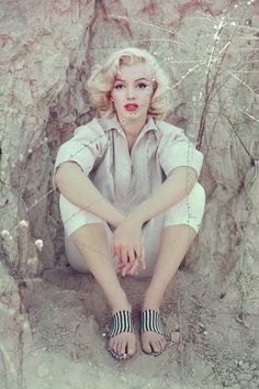 a woman sitting on top of a magazine cover