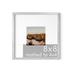 the 8x8 matted to 4x4 photo frame is shown in silver