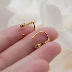 Simple and sleek line ear hook crafted in solid 10k yellow gold Made to Order Ship within 2-3 weeks - Earring size: 12mm in length - Sold as A Pair. - Made in 14 karat gold. - Stamp with 14K. Gold 14k Ear Climbers For Everyday Wear, Gold 14k Everyday Ear Climbers, 14k Gold Everyday Ear Climbers, Classic 14k Gold Ear Climbers, Minimalist Yellow Gold Plated Ear Climbers, Modern 14k Yellow Gold Ear Climbers, Tarnish Resistant Yellow Gold Ear Climbers For Gift, Minimalist 14k Gold Earrings With French Hook, 14k Gold Earrings With French Hook